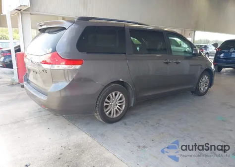 2011 Toyota Sienna Xle V6 z USA, uszkodzony, nr VIN 5TDYK3DC1BS085563